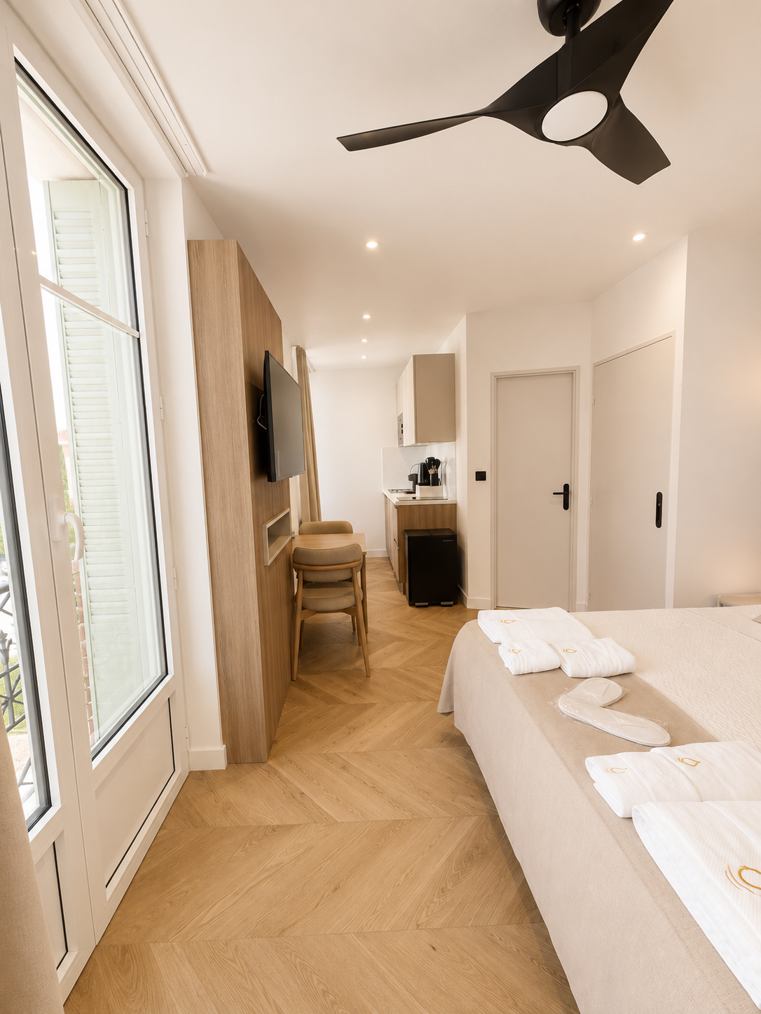 Kitchenette et parquet chevrons de l'Appart' Deluxe